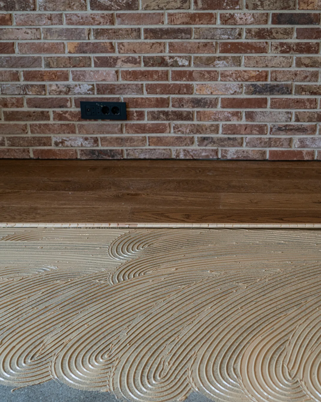 Floors To You OKC installer fitting new flooring in an Oklahoma City home